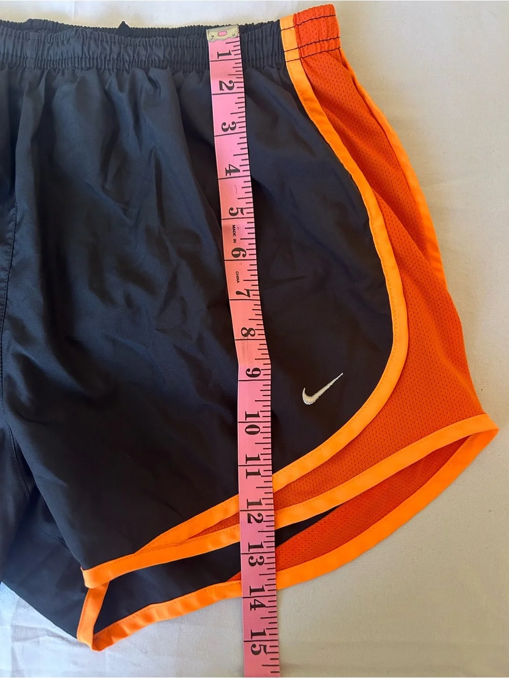 Nike Women’s Black and Orange Athletic Shorts